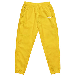 Yellow track pants